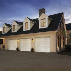 home in san antonio with three clopay premium classic series, traditional style residential garage doors