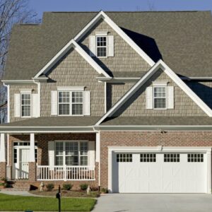 large san antonio home with a white faux wood grain style residential garage door