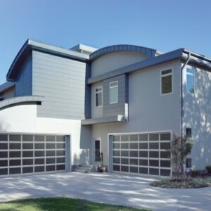large modern grey home with two amarr vista, modern style, full view aluminum residential garage doors