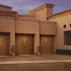 mosaic style home with three clopay canyon ridge, faux wood grain style residential garage doors