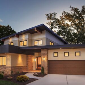 modern home with many windows and a clopay canyon ridge, modern style residential garage door