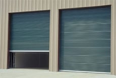 two commercial rolling steel doors