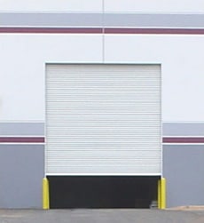 exterior view of commercial rolling door on a warehouse