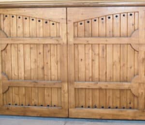 closeup of a ranch house custom wood residential garage door