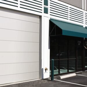 large commercial rolling door on the exterior of a commercial building