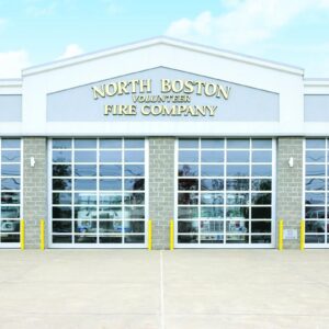 firehouse with four large commercial aluminum full-view doors