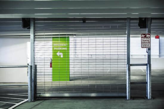 large security grille commercial rolling garage door on a commercial building