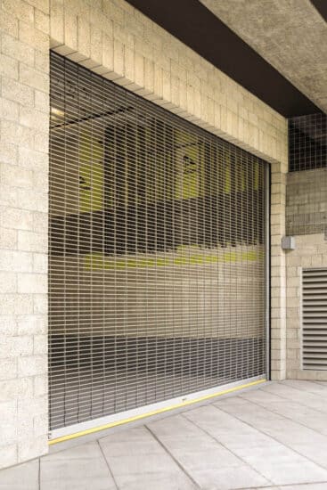 large security grille commercial rolling garage door on a commercial building