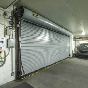 large commercial rolling garage door in a parking garage
