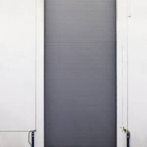 interior view of a very tall and skinny commercial rolling door