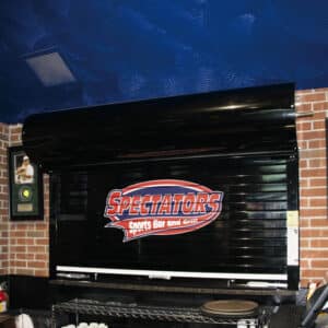 interior commercial rolling door in a sports bar and grill restaurant
