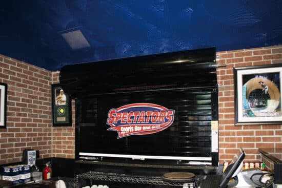interior commercial rolling door in a sports bar and grill restaurant