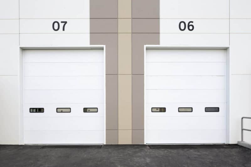 commercial garage doors on a warehouse building