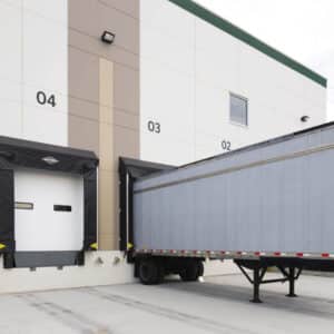 commercial garage doors on a warehouse building
