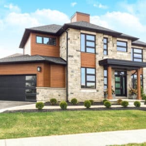 large residential modern home with modern style, flush contemporary panel garage door