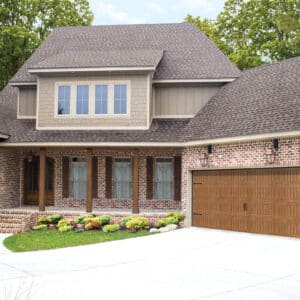 residential home with a faux wood grain style, sonoma/sonoma ranch panel garage doors