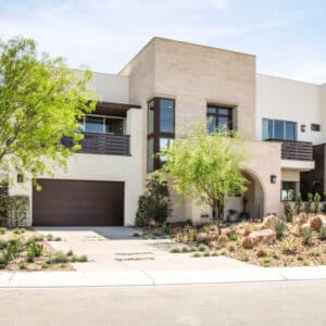 large residential modern home with modern style, flush contemporary panel garage door