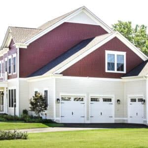 large san antonio home with three white carriage style, sonoma/sonoma ranch panel residential garage door