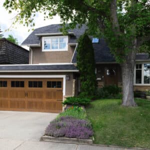 large home with a sonoma natural oak colored wayne-dalton 9800, faux wood grain style, fiberglass residential garage door